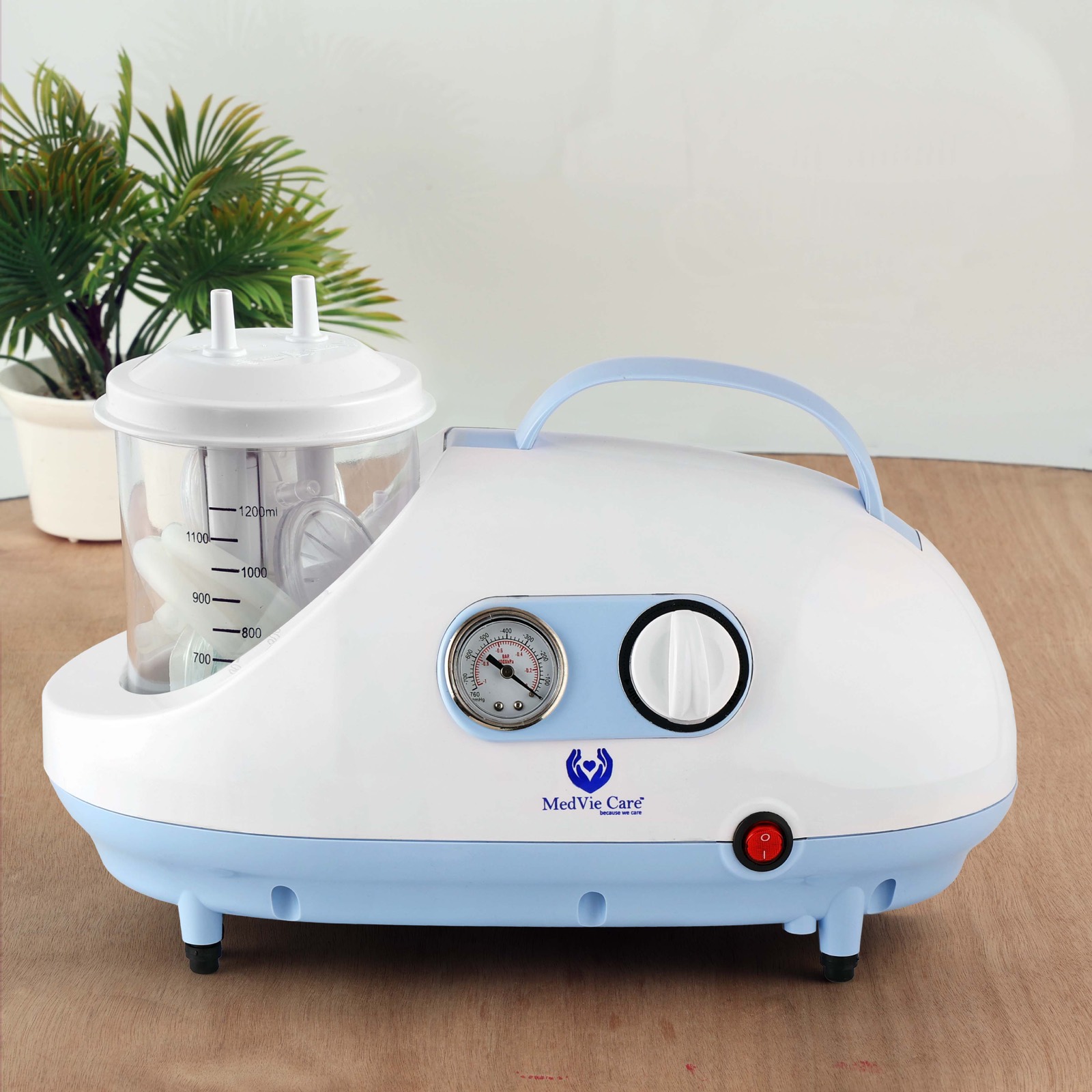 Portable suction machine with accessories